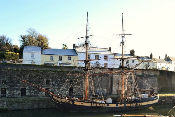 Square rigged wooden ships at Charlestown harbour